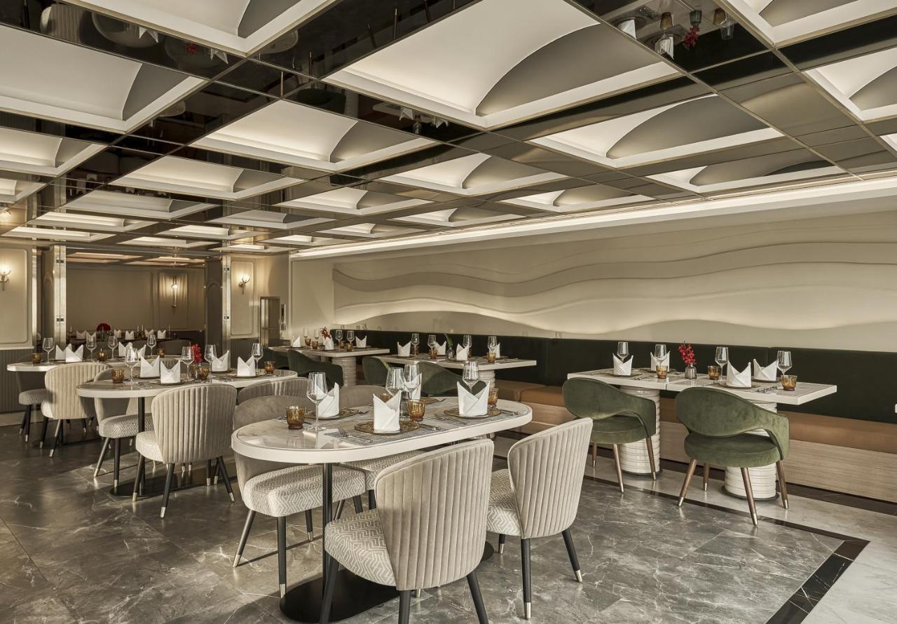 מלון הו צ'י מין סיטי La Siesta Premium Saigon מראה חיצוני תמונה The interior of the restaurant